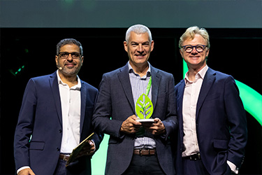 SAGE Automation’s Executive General Manager, Justin Kahl, accepting the Schneider Electric Sustainability Impact Award